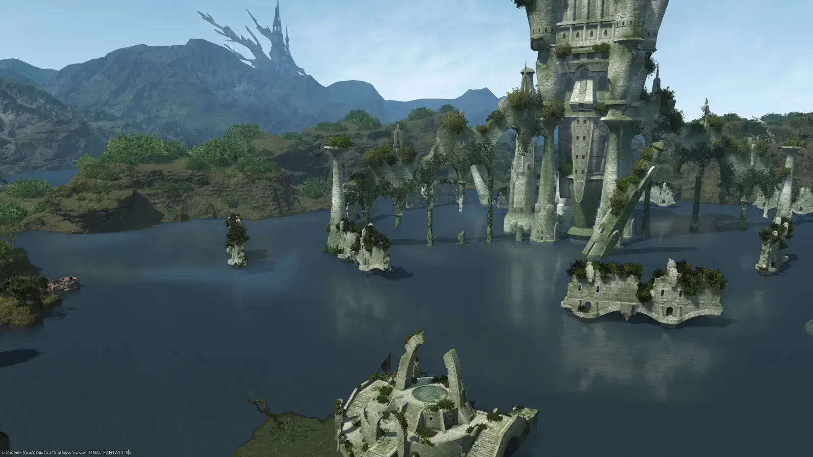 A view of the Wanderer's Palace atop the Bronze Lake, separating the two sides of Upper La Noscea. The blue waters cleanly reflects the debris scattered within, with small, tree covered mountains dotting the background.